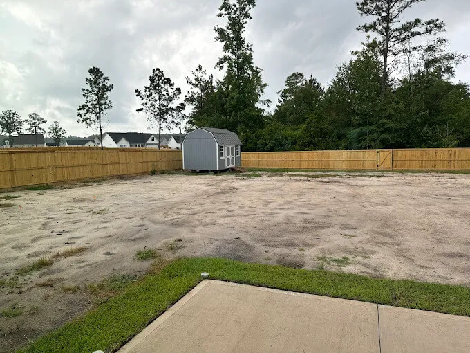 DIY fence gate installation underway by a homeowner in Onslow County NC showing the challenges tackled without Nelson Fence Company