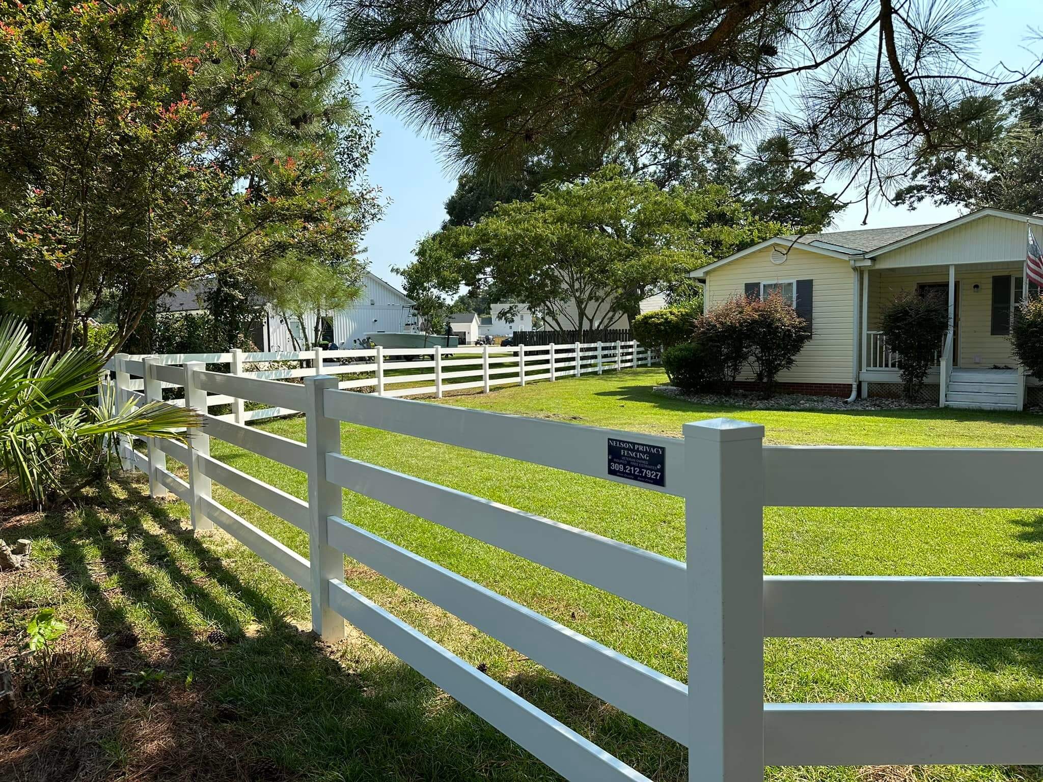 Nelson Fence Company completes a professional wood fence gate installation in Onslow County NC with expert craftsmanship A Nelson Fence Company professional installs a sturdy wood fence gate for a residential property in Onslow County NC
